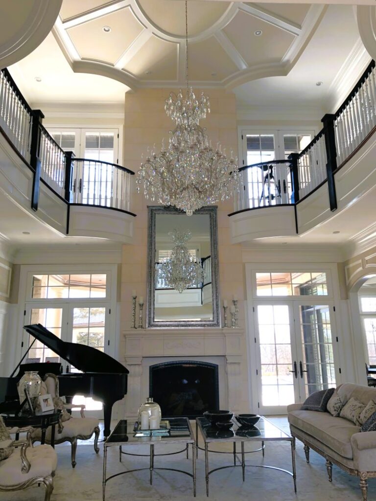 Thumbnail of http://Living%20room%20with%20firepit%20and%20view%20of%20first%20floor%20windows