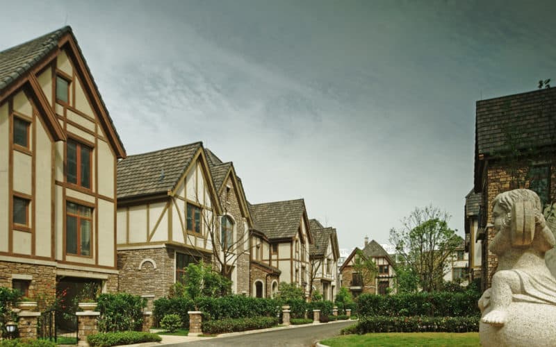 Left side Street view of Tudor Custom townhome