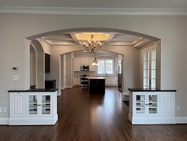 arched opening with bookcases for Luxury Custom Home in Clayton