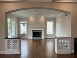 arched opening with bookcases for Luxury Custom Home in Clayton
